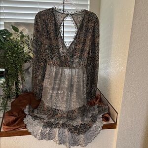 Boho dress by Blue b. with laced detail and open back & high-low cut.